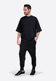 Model wearing men's joggers by East Vibe